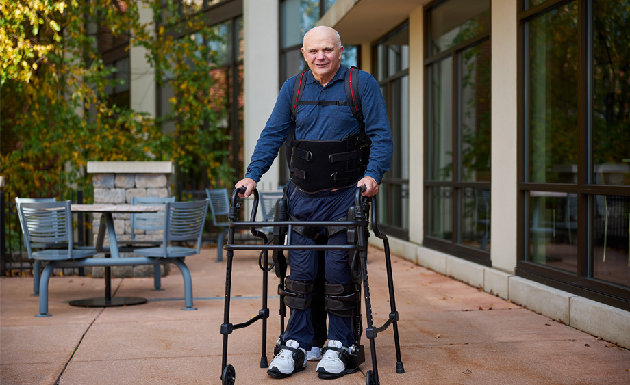 Spinal cord injury patient standing in the Ekso Bionics Exoskeleton.